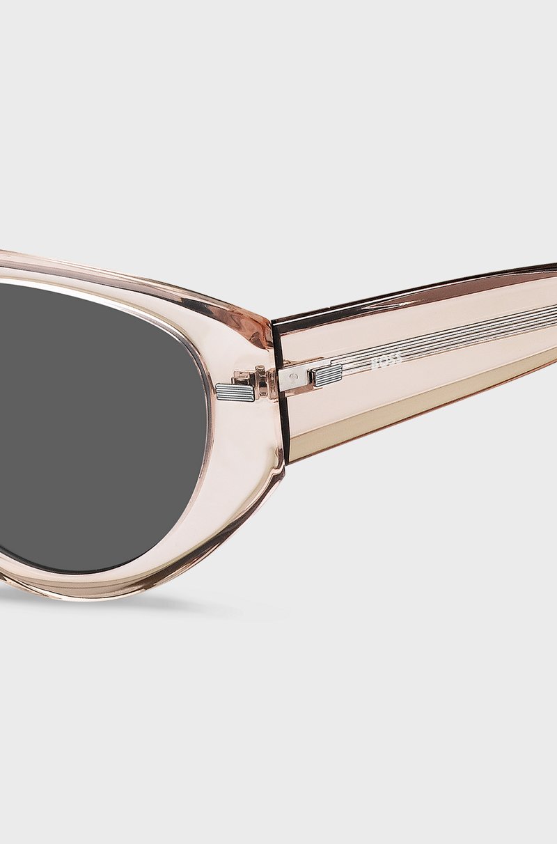 Hugo Boss Gafas de sol de bioacetato rosa traslúcido con detalles estampados