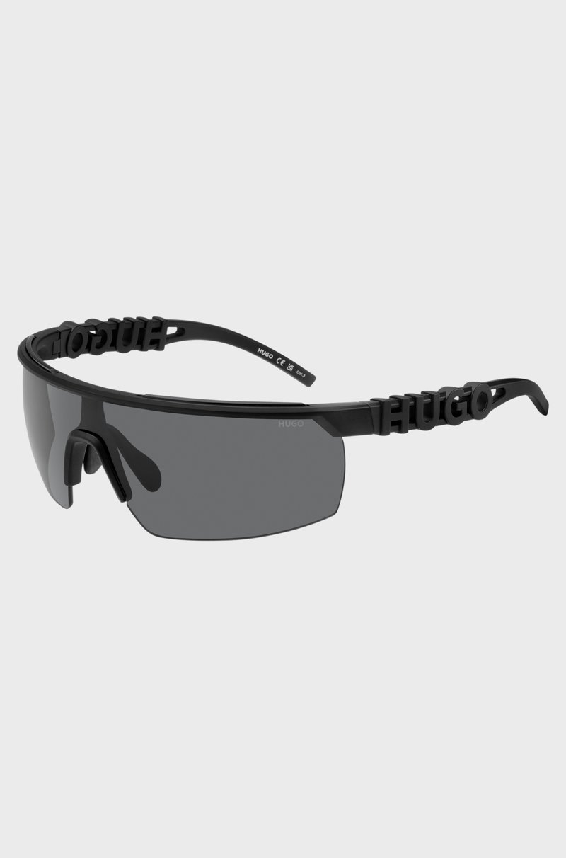 Hugo Boss Gafas de sol de estilo máscara en negro con logo en 3D en las patillas