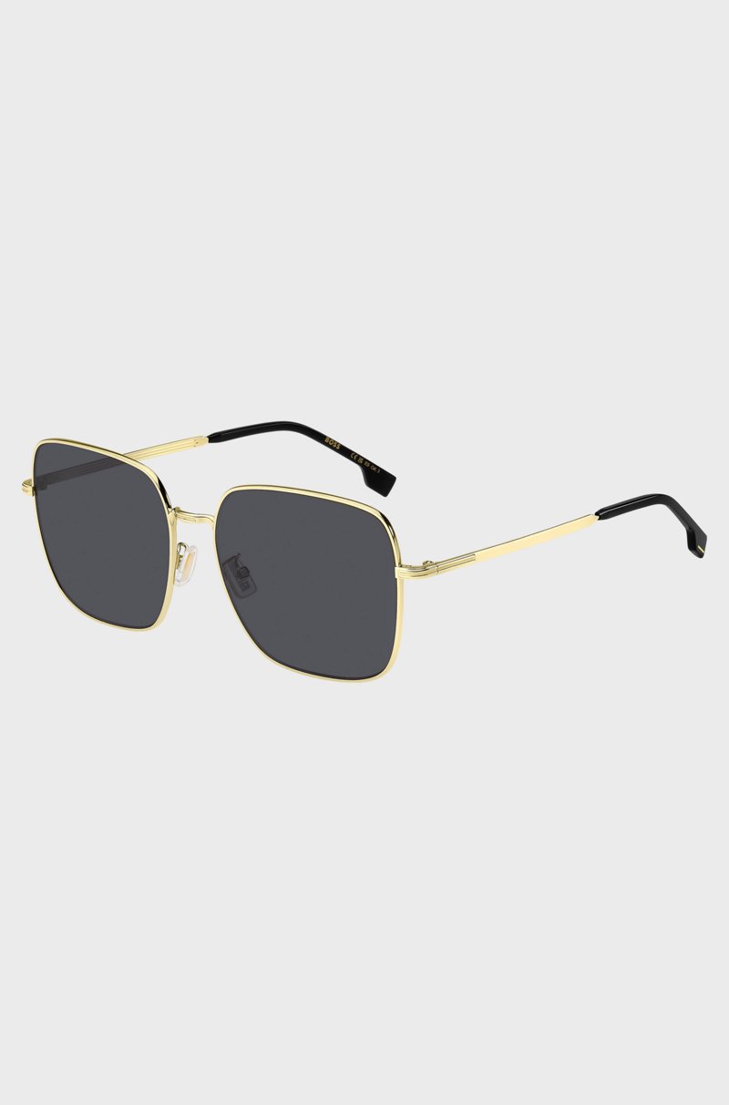 Hugo Boss Gafas de sol en tono dorado con herrajes de la marca