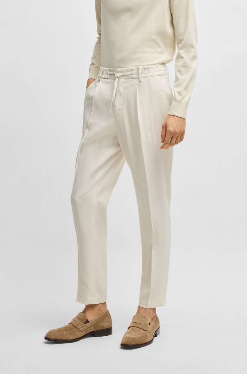 Hugo Boss Pantalones tapered fit en mezcla de lino
