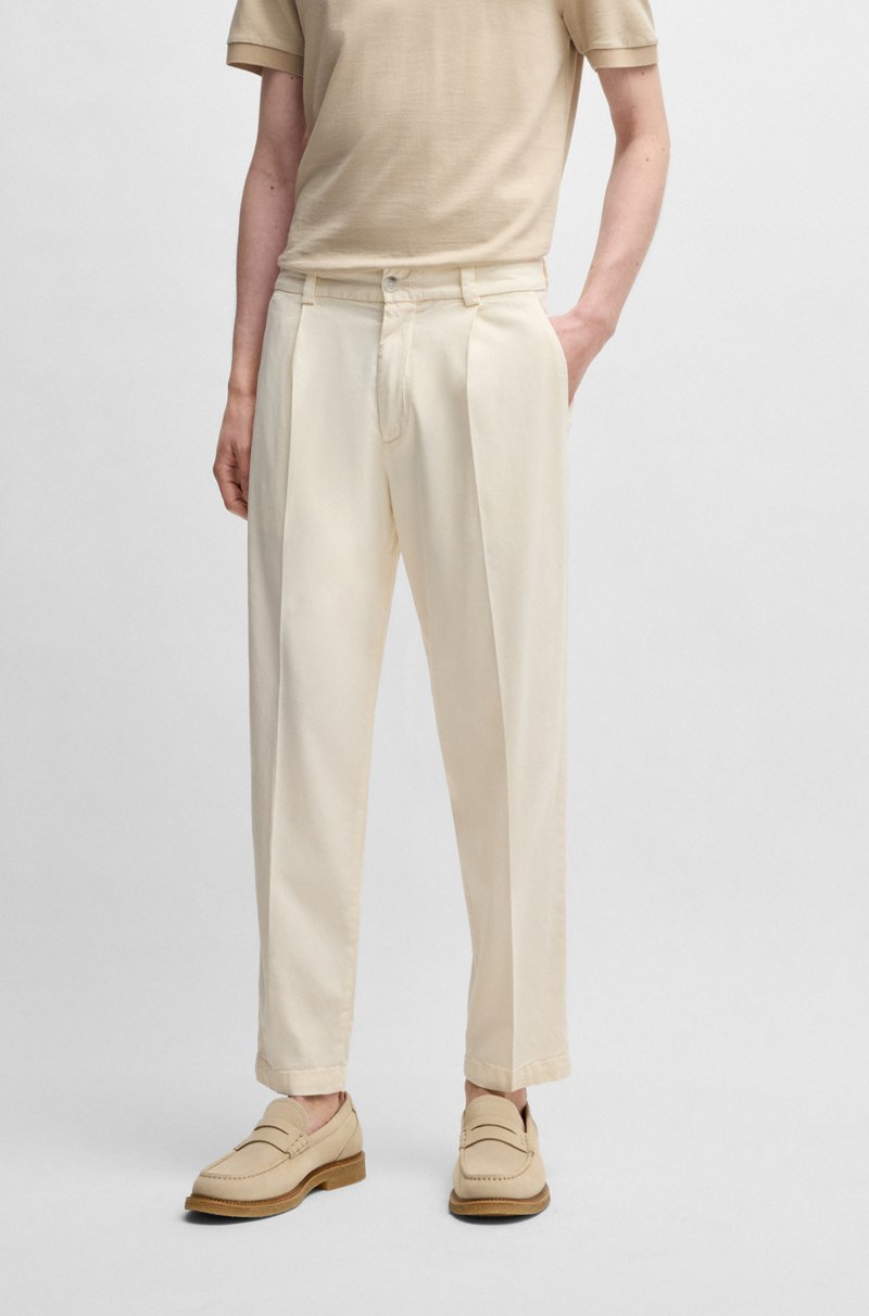 Hugo Boss Pantalones tapered fit en sarga elástica