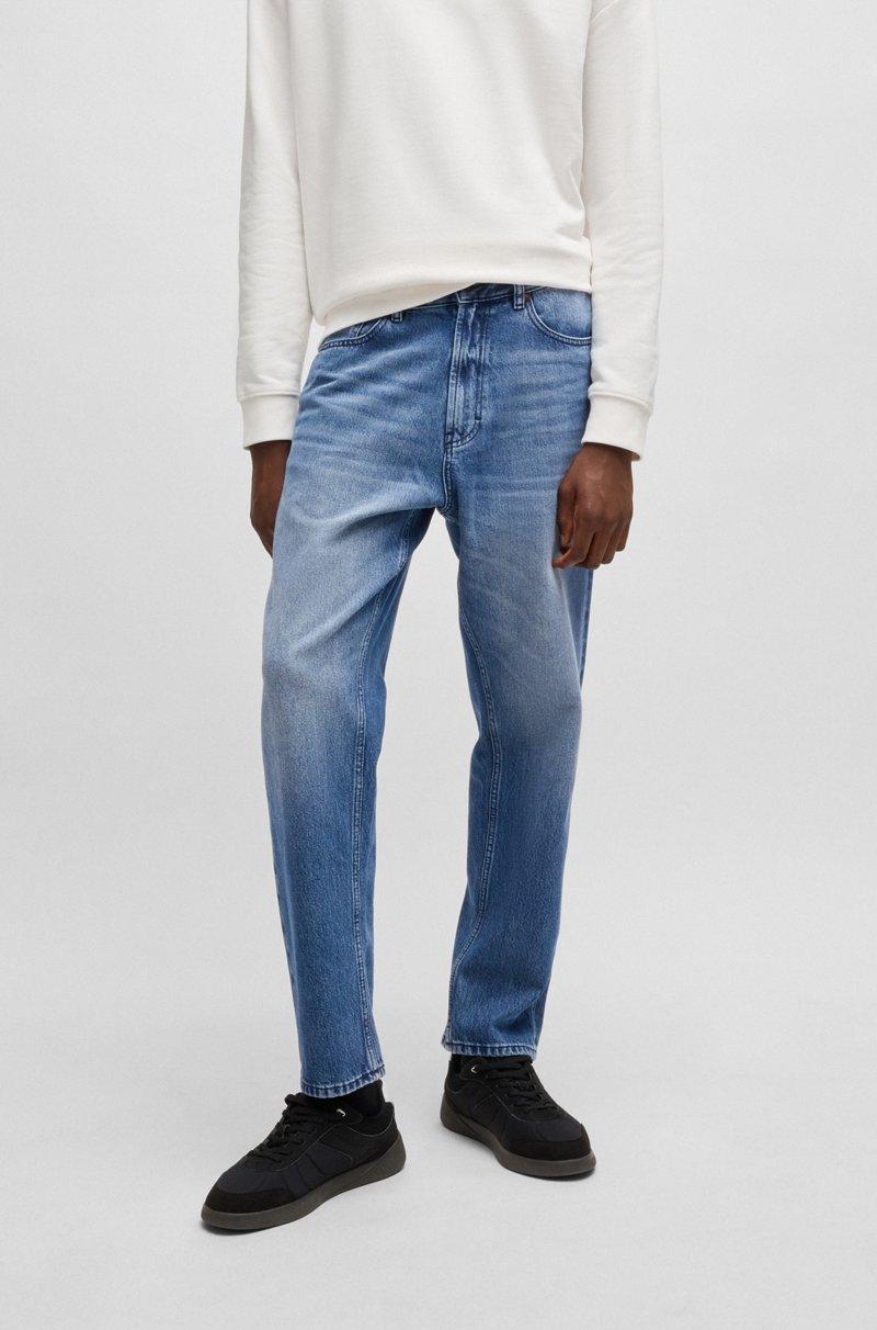 Hugo Boss Jeans tapered fit en denim azul con lavado vintage