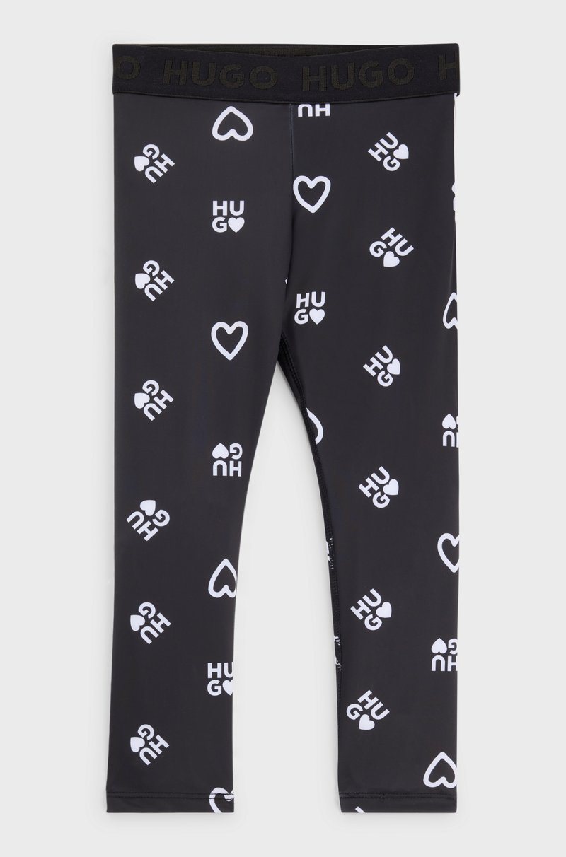 Hugo Boss Leggings elásticos para niños con corazones y logos estampados