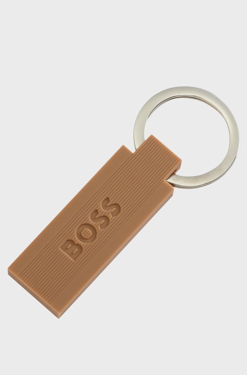 Hugo Boss Llavero con logo en silicona de color cámel y latón