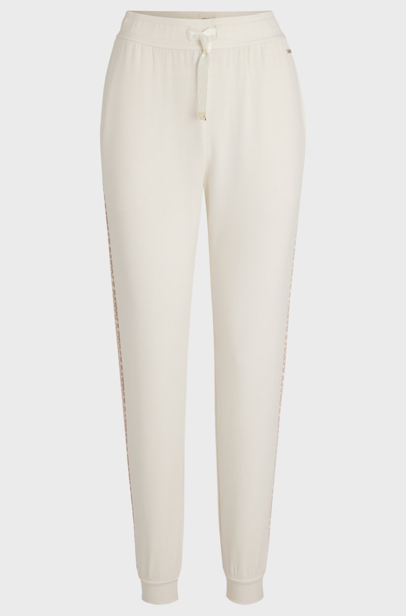 Hugo Boss Pantalones de chándal con detalle de monogramas en modal y seda