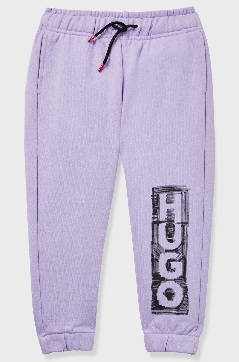 Hugo Boss Pantalones de chándal de algodón para niños con logo estilo rotulador
