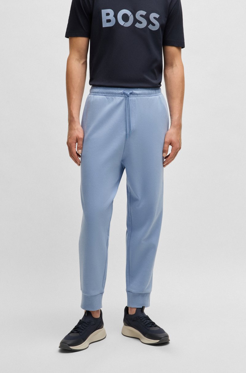 Hugo Boss Pantalones de chándal en algodón elástico con logo estampado