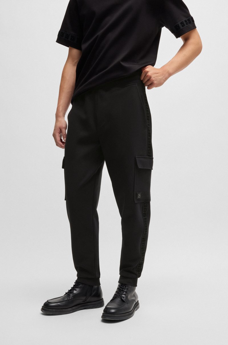 Hugo Boss Pantalones de chándal en algodón elástico con logo apilado
