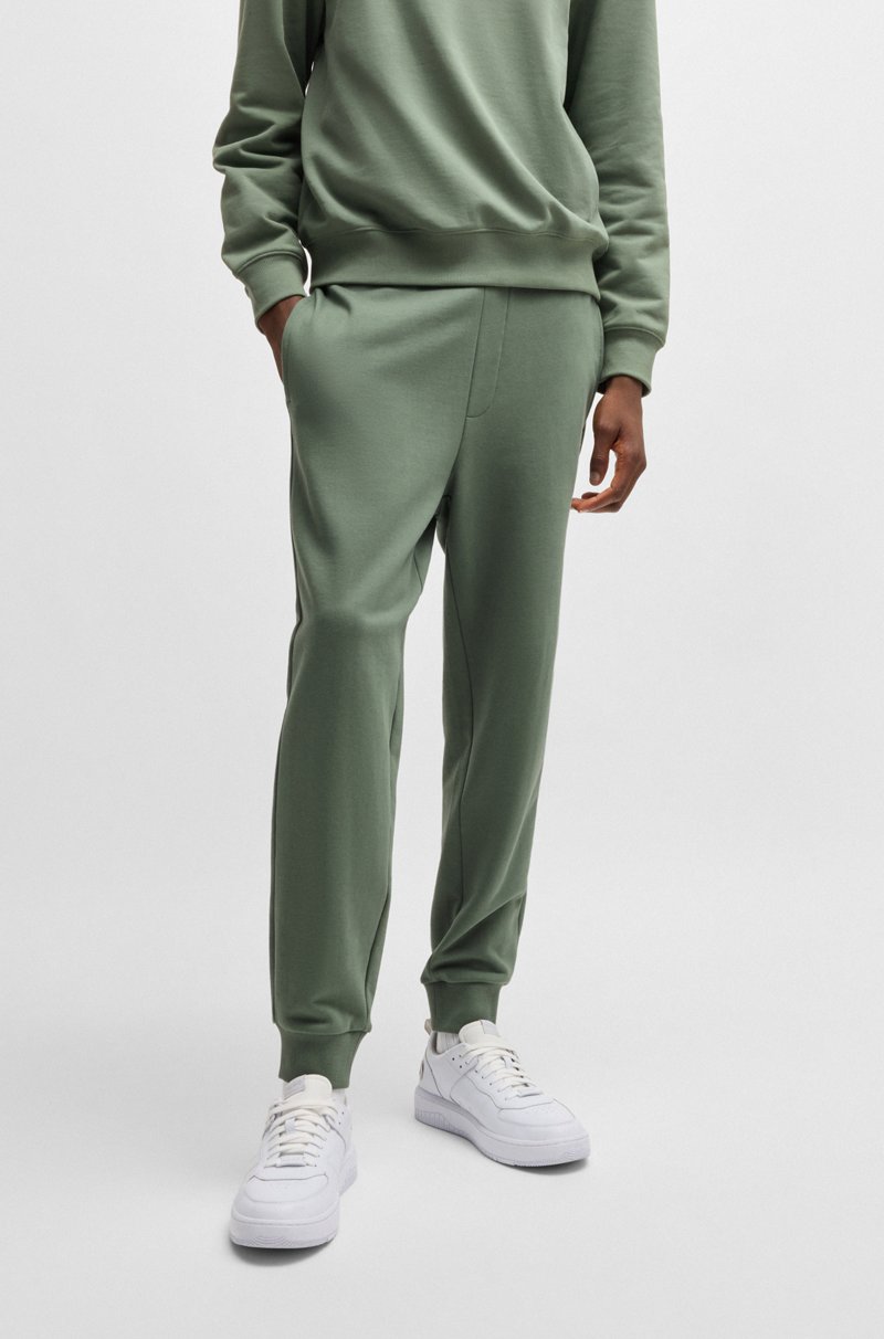 Hugo Boss Pantalones de chándal en felpa de algodón con logo estampado
