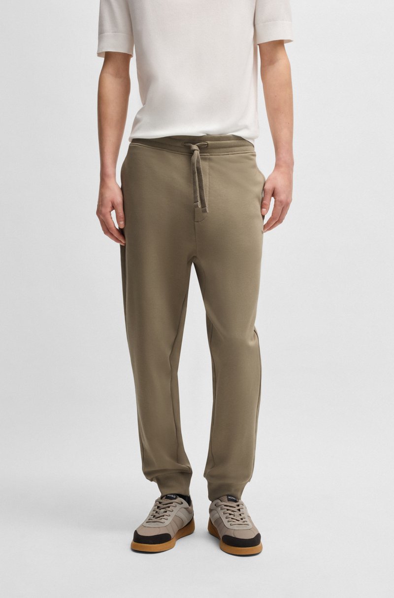 Hugo Boss Pantalones de chándal en felpa de algodón con logo estampado
