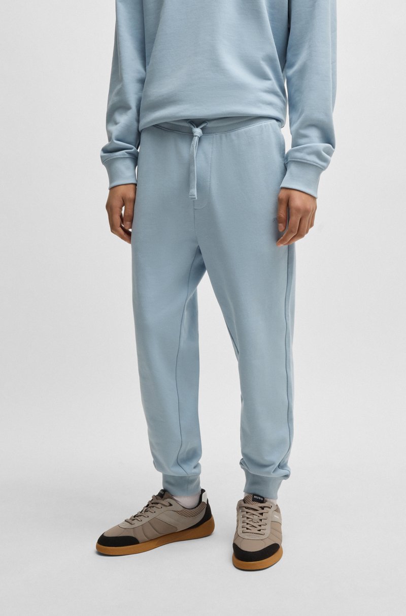 Hugo Boss Pantalones de chándal en felpa de algodón con logo estampado