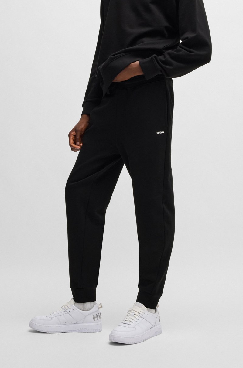 Hugo Boss Pantalones de chándal en felpa de algodón con logo estampado