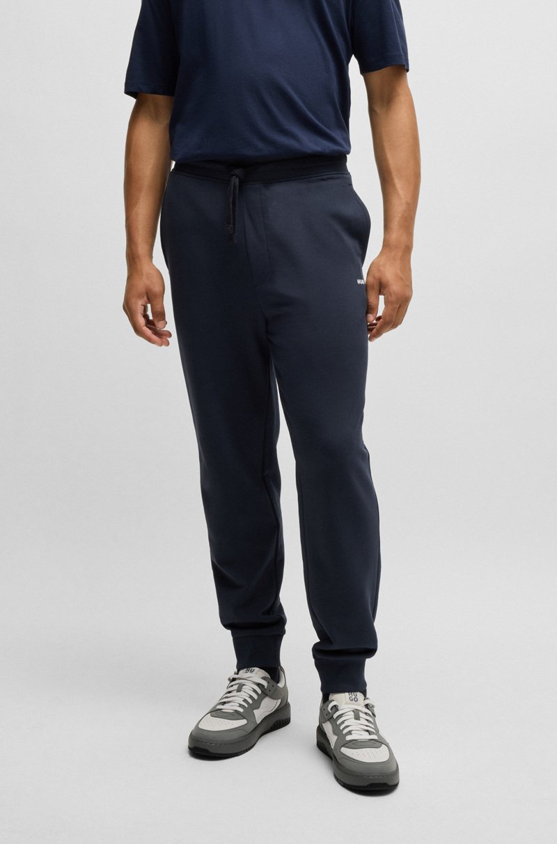 Hugo Boss Pantalones de chándal en felpa de algodón con logo estampado