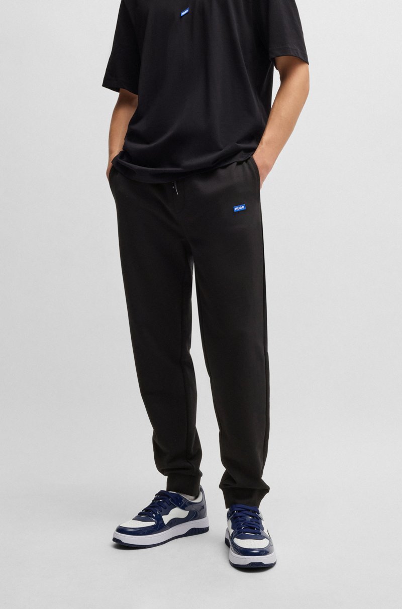 Hugo Boss Pantalones de chándal en felpa de algodón con parche de logo azul