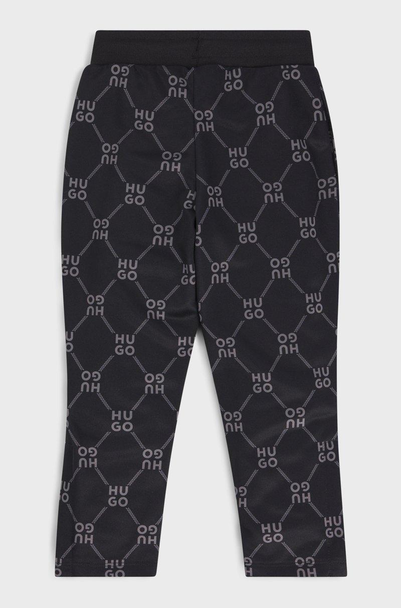 Hugo Boss Pantalones De Chándal Loose Fit Para Niños Con Logo Apilado Estampado