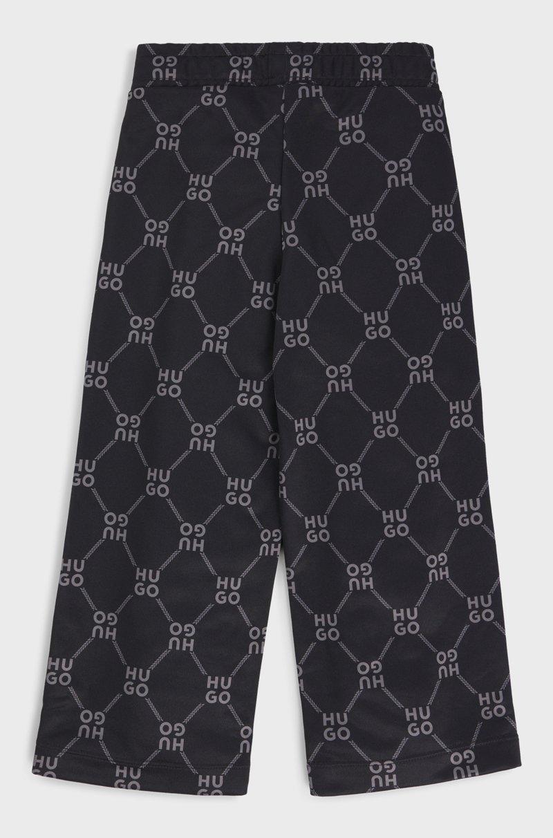 Hugo Boss Pantalones De Chándal Loose Fit Para Niños Con Logo Apilado Estampado