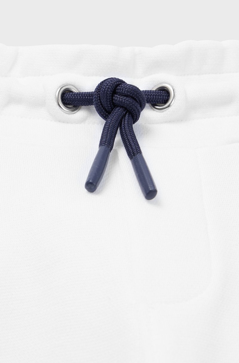 Hugo Boss Pantalones De Chándal Para Niños Con Puños En Los Bajos Y Logo En La Parte Trasera