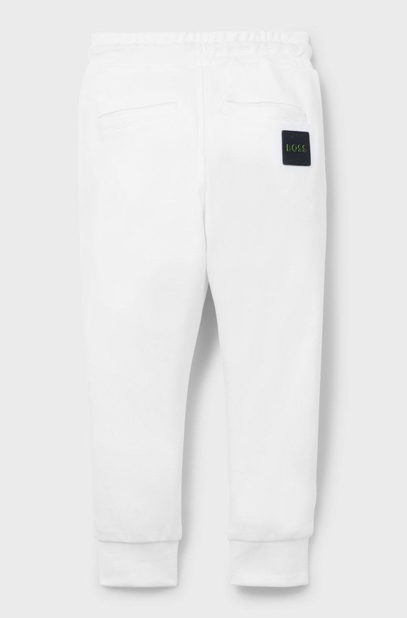 Hugo Boss Pantalones De Chándal Para Niños Con Puños En Los Bajos Y Logo En La Parte Trasera