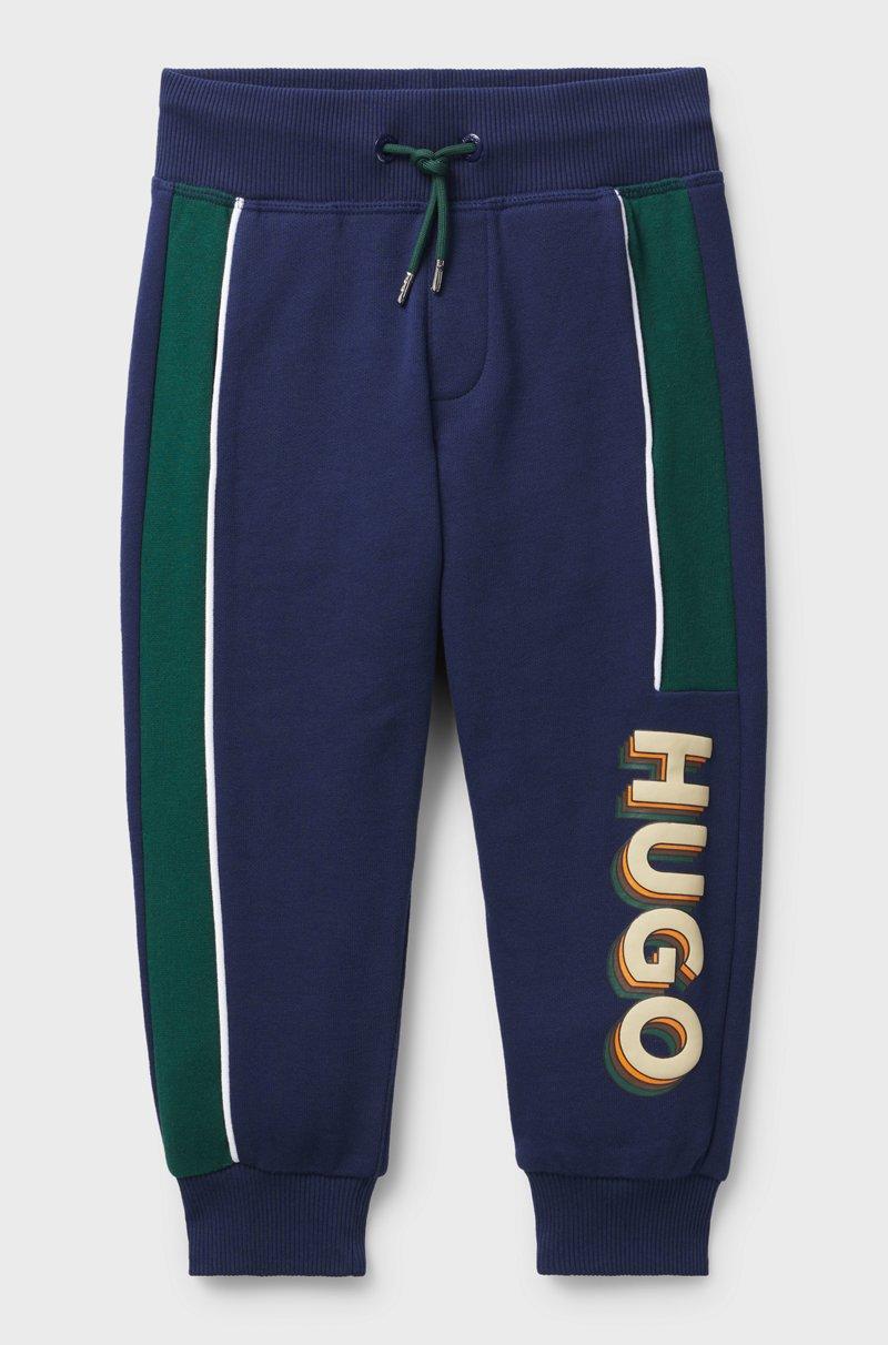 Hugo Boss Pantalones de chándal para niños en algodón con ribetes y logo
