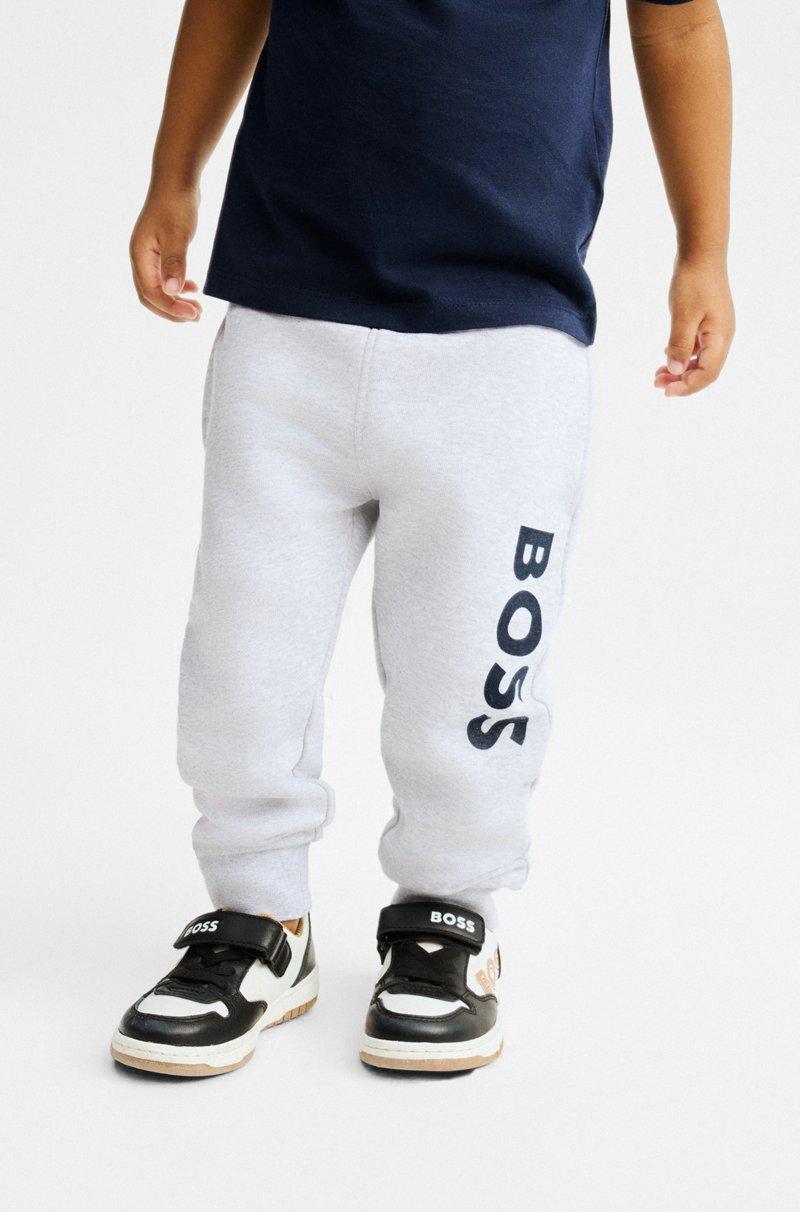 Hugo Boss Pantalones de chándal para niños en forro polar con logo vertical estampado