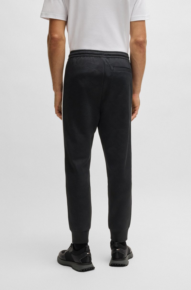 Hugo Boss Pantalones De Chándal Relaxed Fit Con Círculos Tejidos En Jacquard