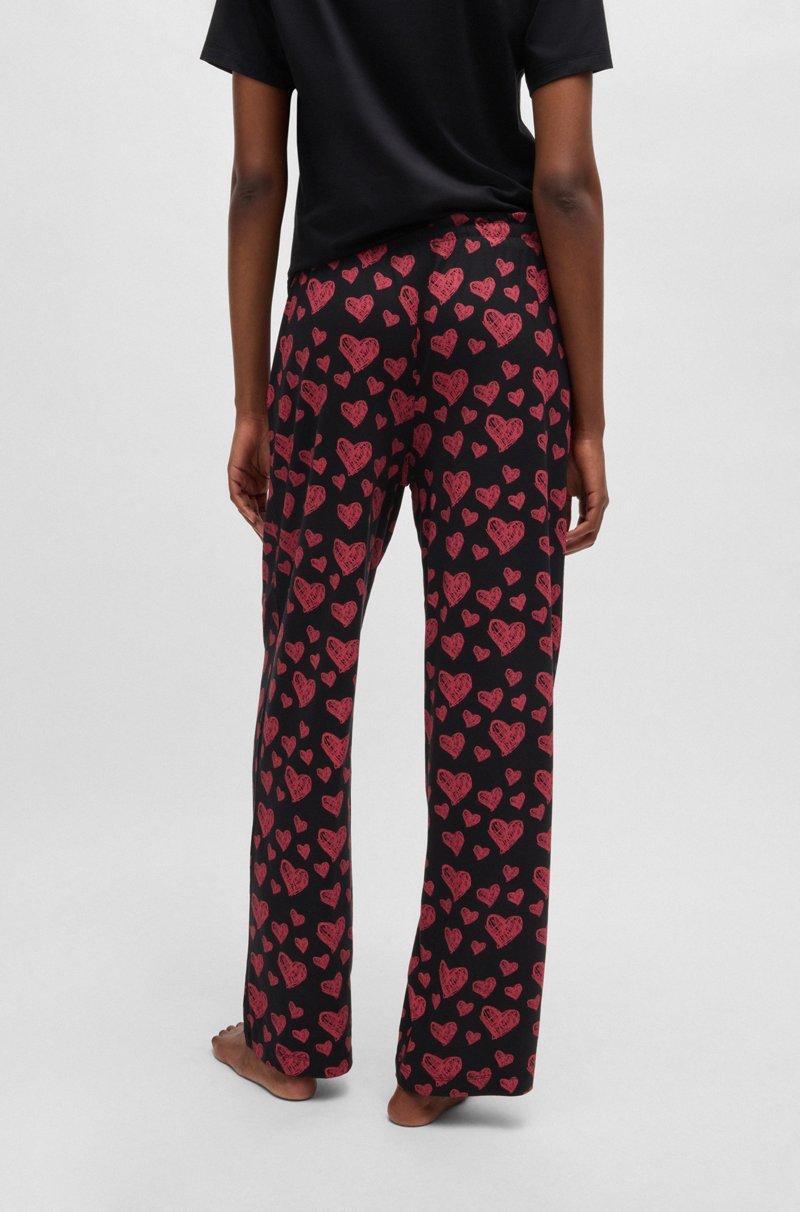 Hugo Boss Pantalones de pijama de punto de mezcla de modal con estampado integral de corazones