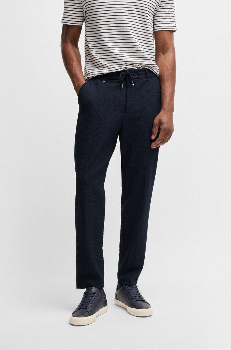 Hugo Boss Pantalones formales de tejido de sirsaca elástico