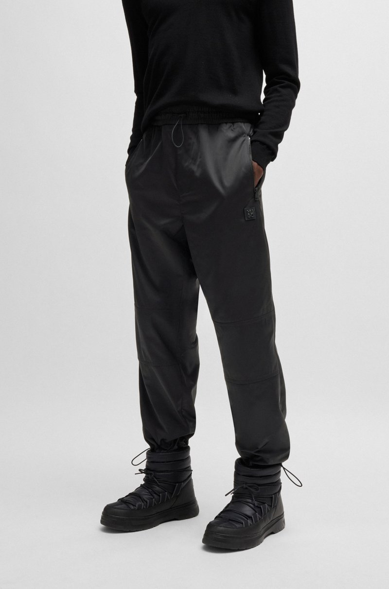 Hugo Boss Pantalones regular fit de raso repelente al agua