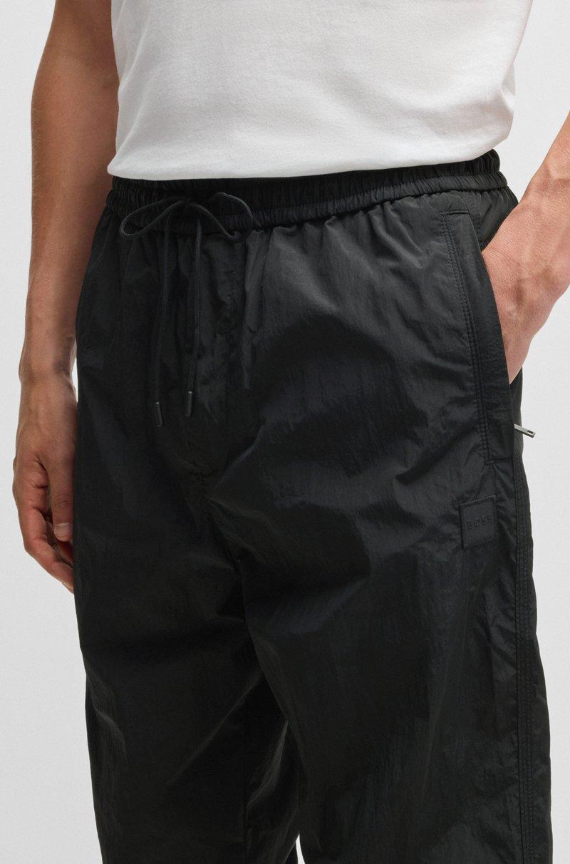 Hugo Boss Pantalones Relaxed Fit En Tejido Ligero Repelente Al Agua