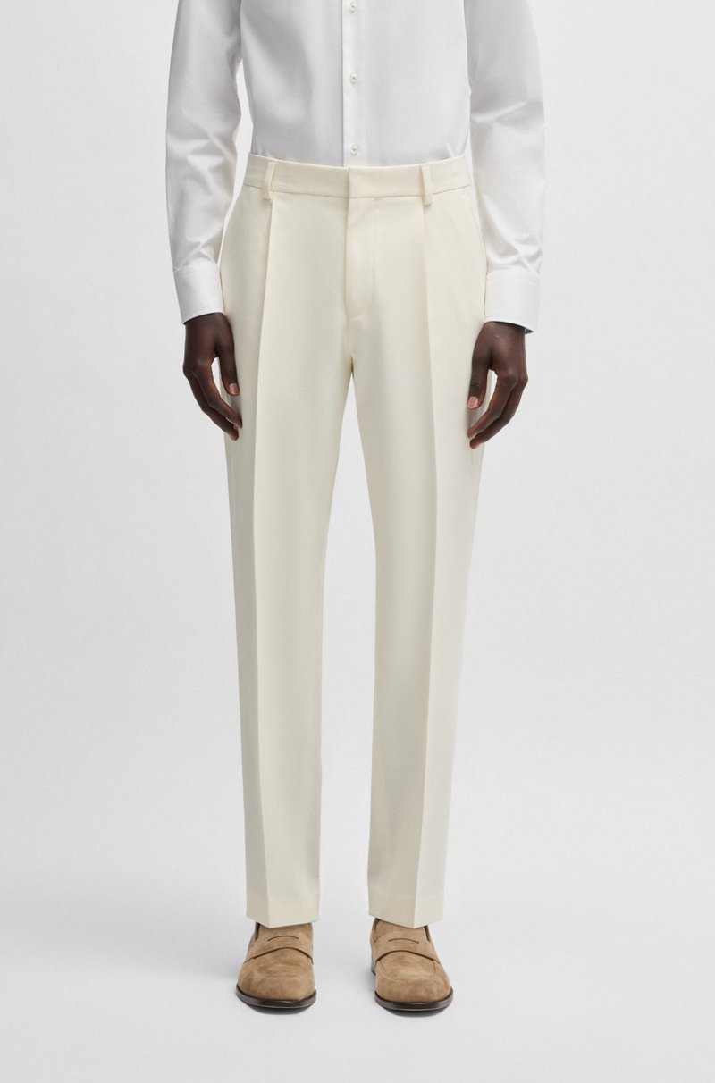 Hugo Boss Pantalones relaxed fit lavables en sarga elástica con lana