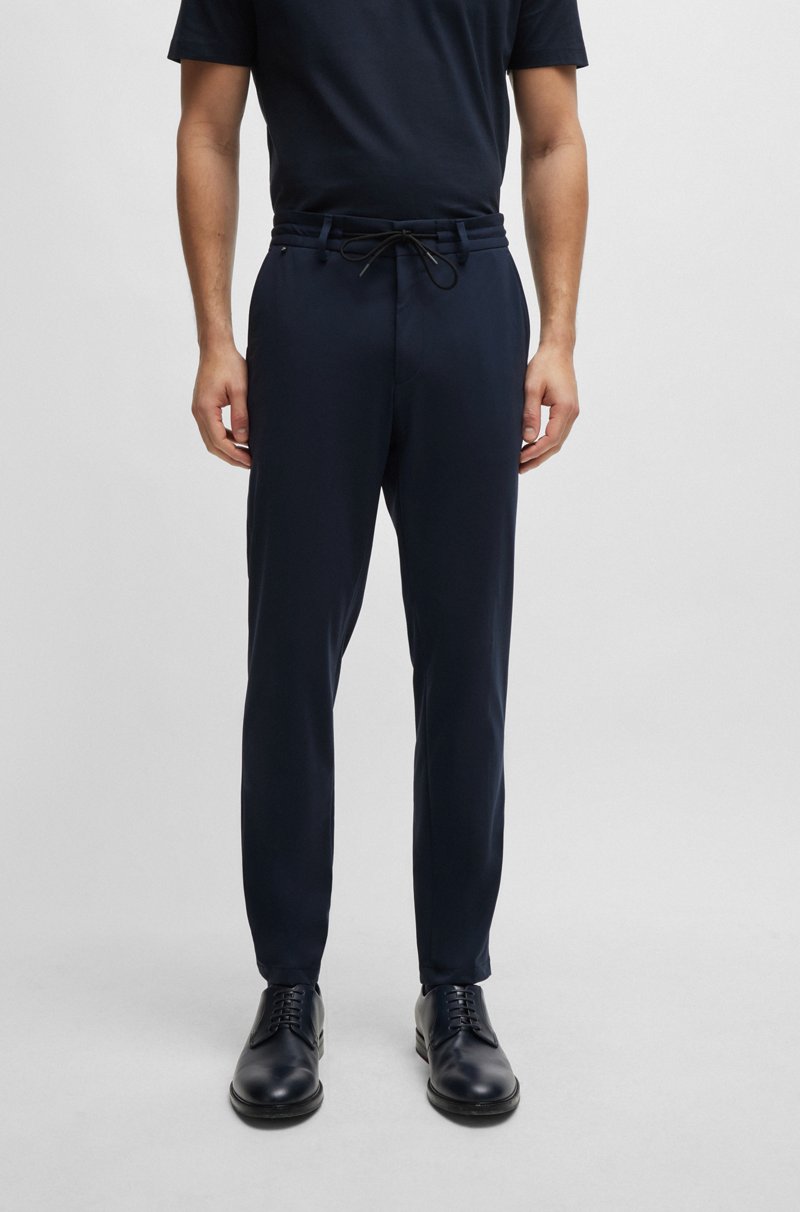 Hugo Boss Pantalones slim fit de punto técnico elástico