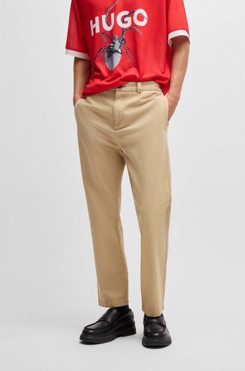 Hugo Boss Pantalones slim fit de tiro medio en sarga de algodón
