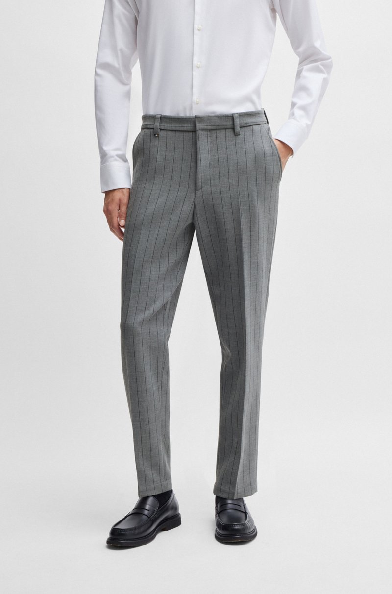Hugo Boss Pantalones slim fit en tejido elástico con raya diplomática