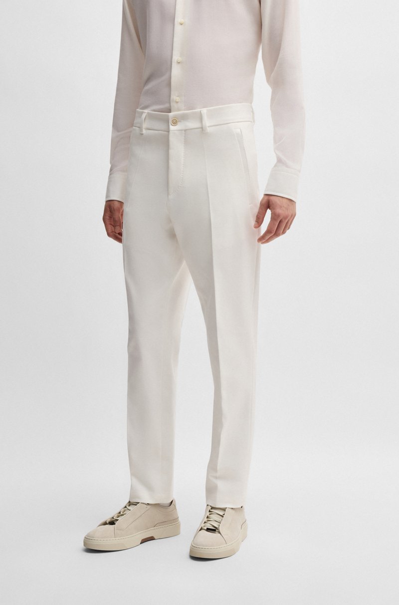 Hugo Boss Pantalones tapered fit de algodón elástico con estructura de tejido doble