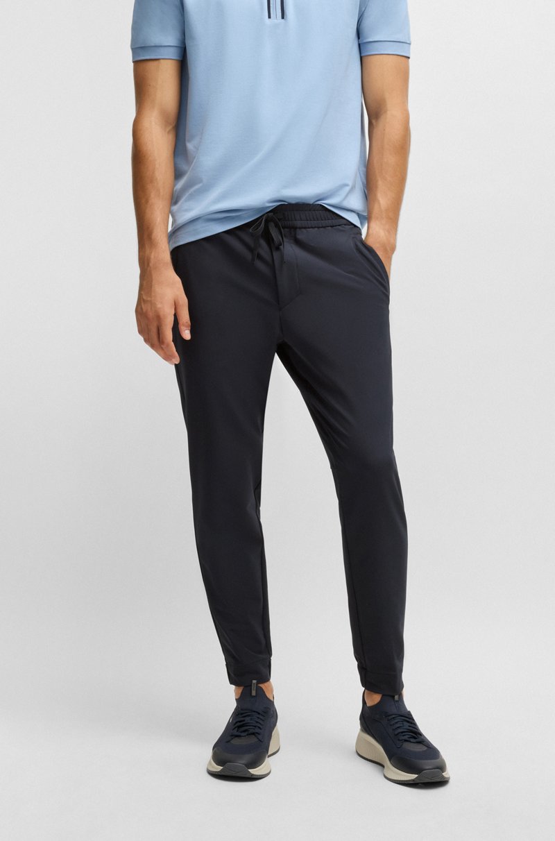 Hugo Boss Pantalones tapered fit de tejido elástico repelente al agua