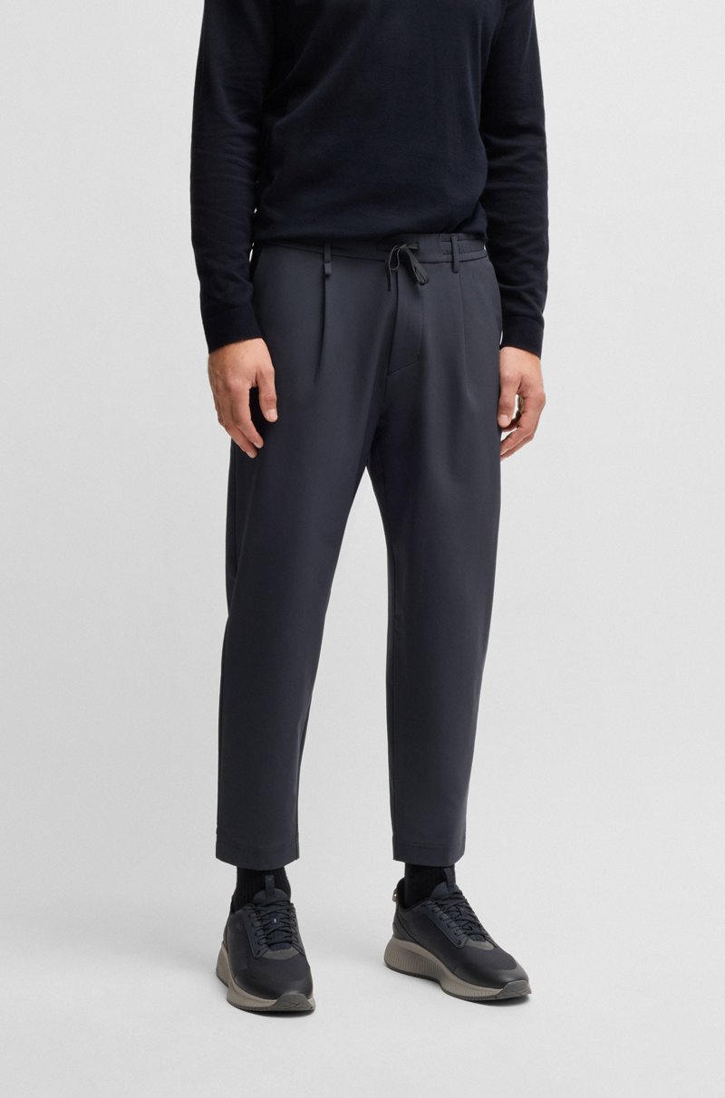 Hugo Boss Pantalones tapered fit de tejido elástico repelente al agua
