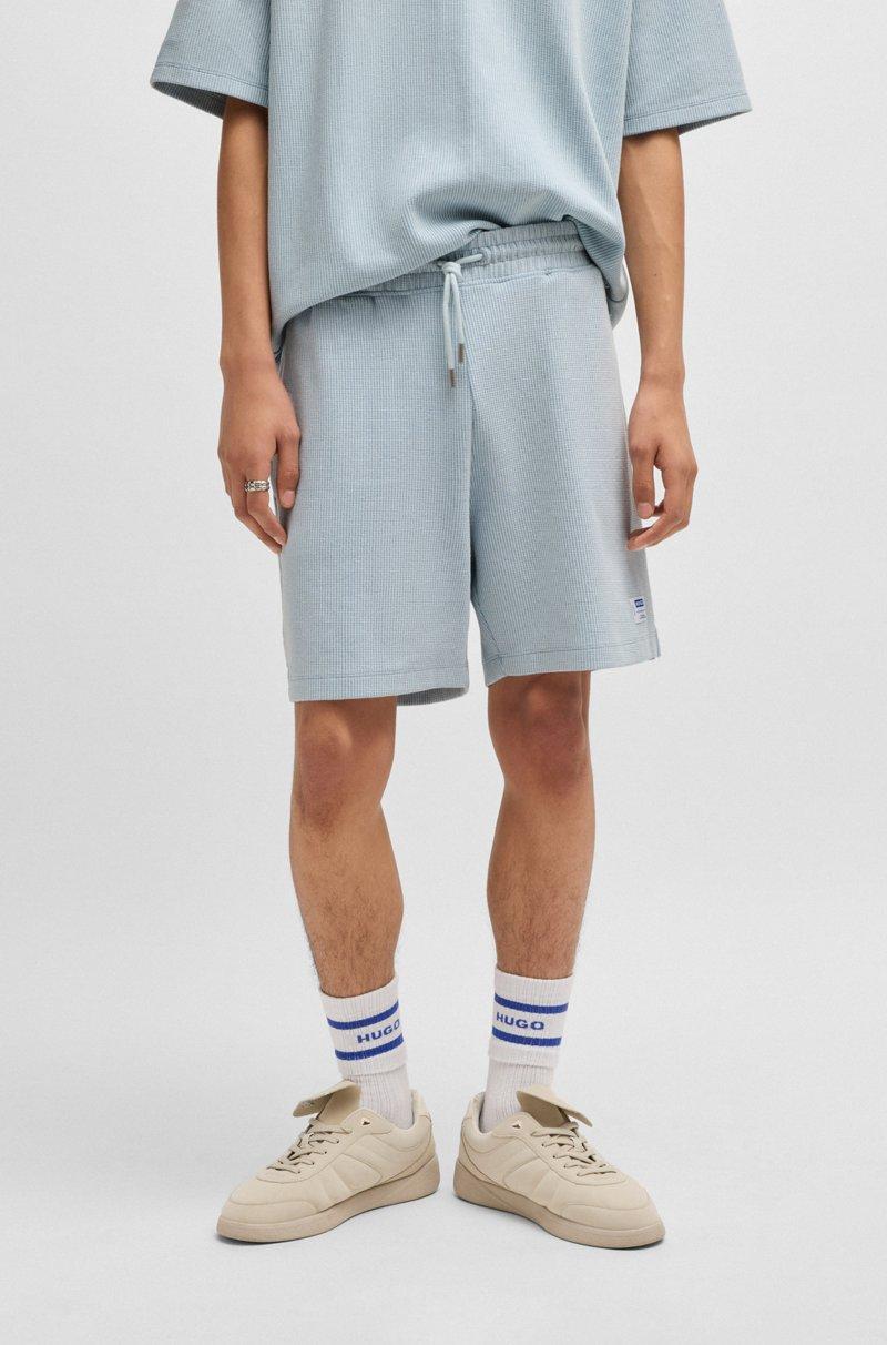 Hugo Boss Shorts de corte holgado en algodón con estructura de rejilla