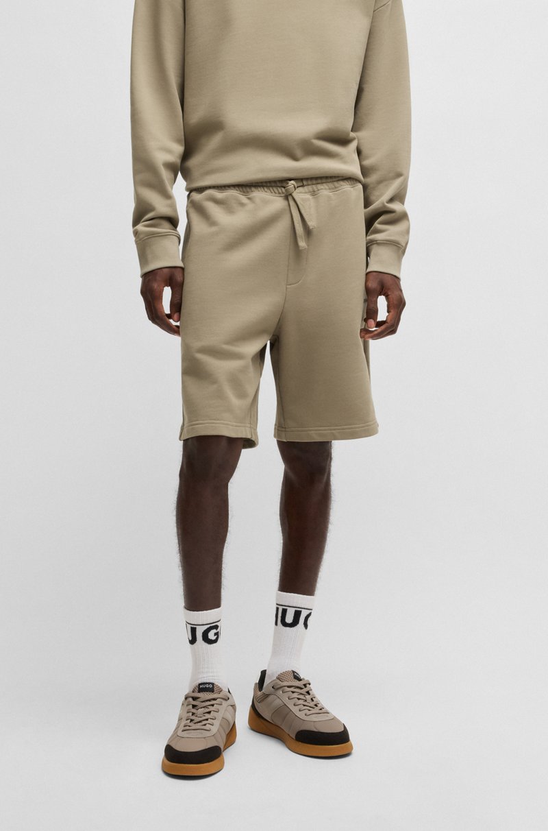 Hugo Boss Shorts relaxed fit en felpa de algodón con logo estampado