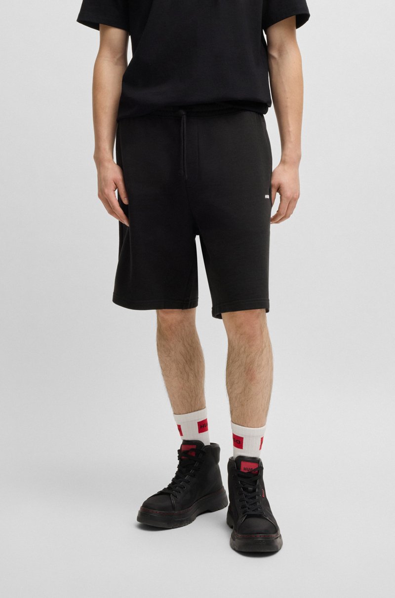 Hugo Boss Shorts relaxed fit en felpa de algodón con logo estampado