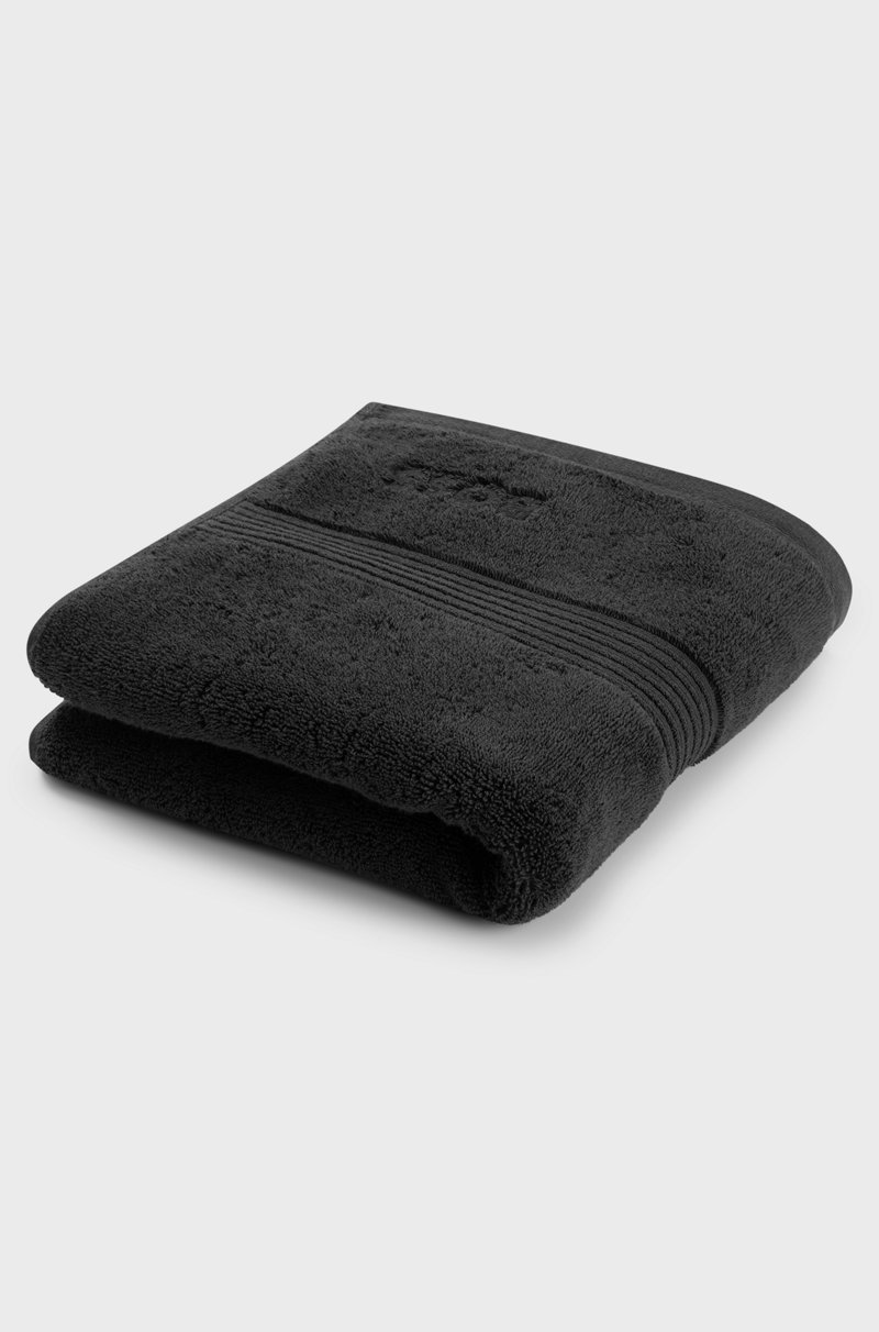 Hugo Boss Toalla de mano de algodón del Egeo negro con logo tonal