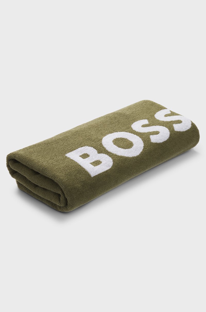 Hugo Boss Toalla de playa de jacquard de algodón con logo y rayas de la marca