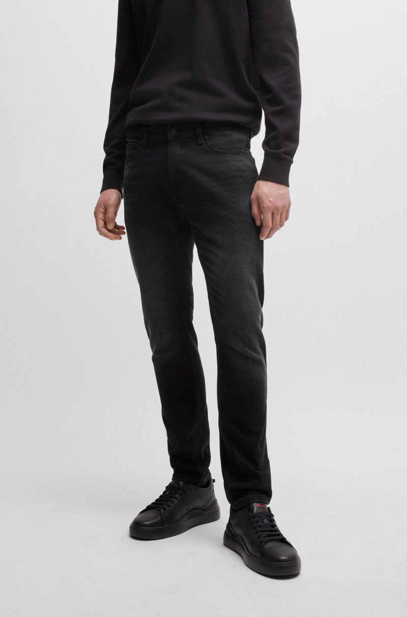 Hugo Boss Vaqueros extra slim fit de denim elástico en color negro intenso