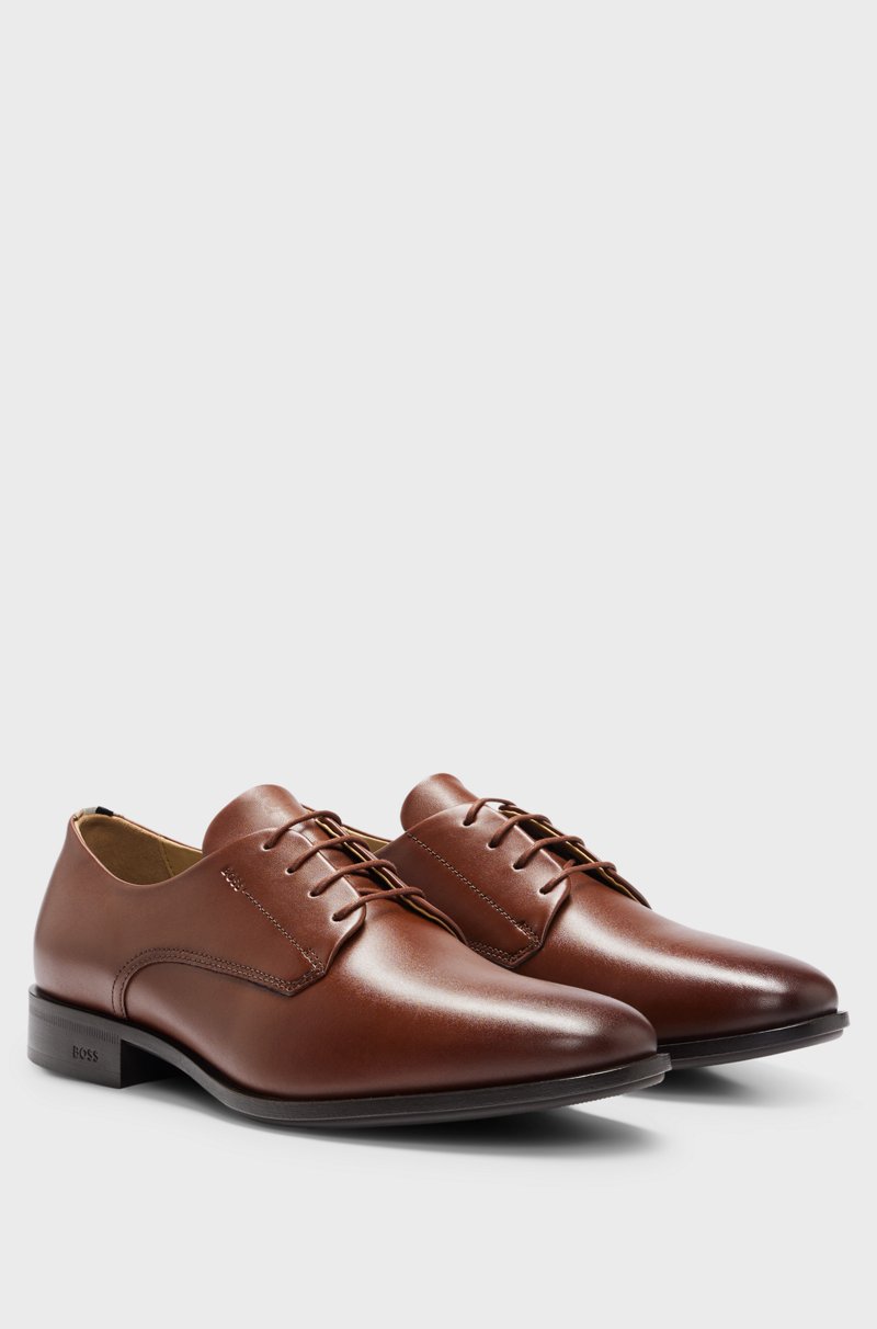 Hugo Boss Zapatos Derby de piel con ribetes de la marca