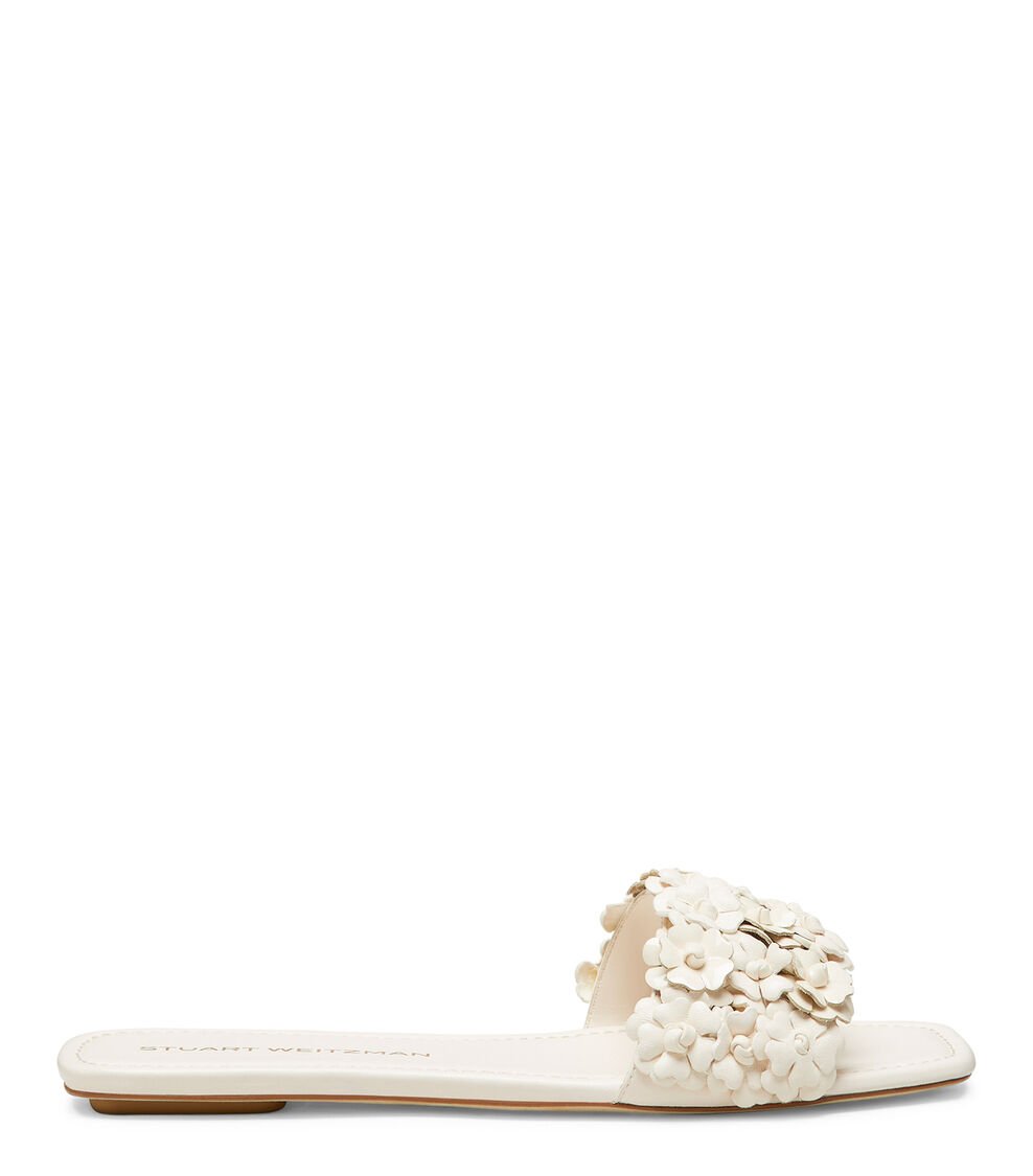 Stuart Weitzman MEADOW FLAT SLIDE en SEASHELL de Mujer | Stuart Weitzman®