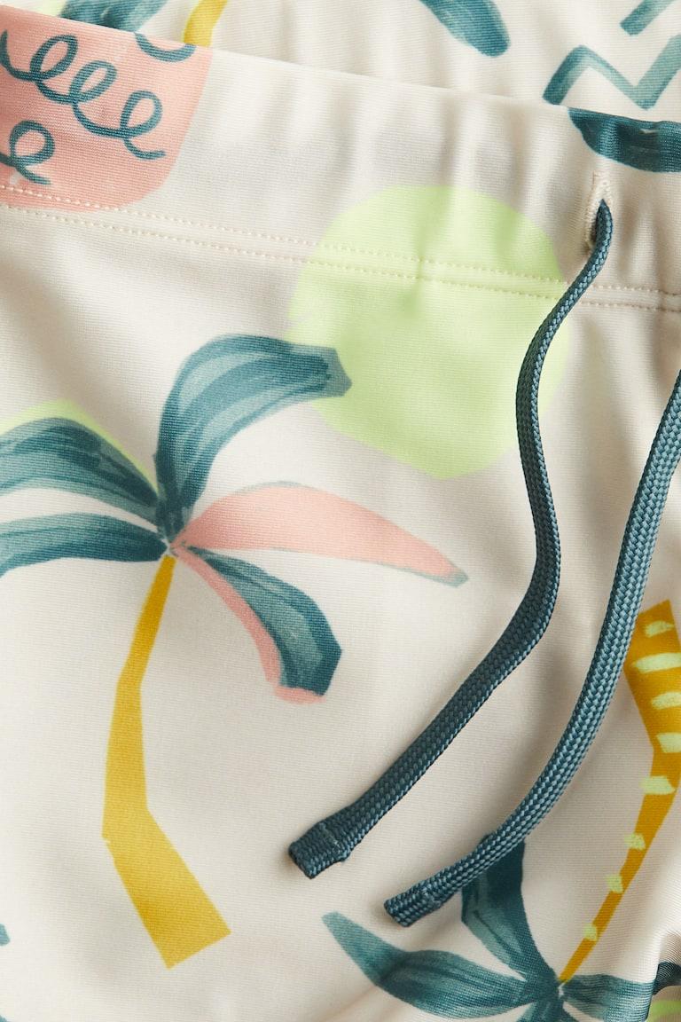 H&M Bañador Ajustado Con Diseño Estampado - Marrón/Rayas Blancas - NIÑOS