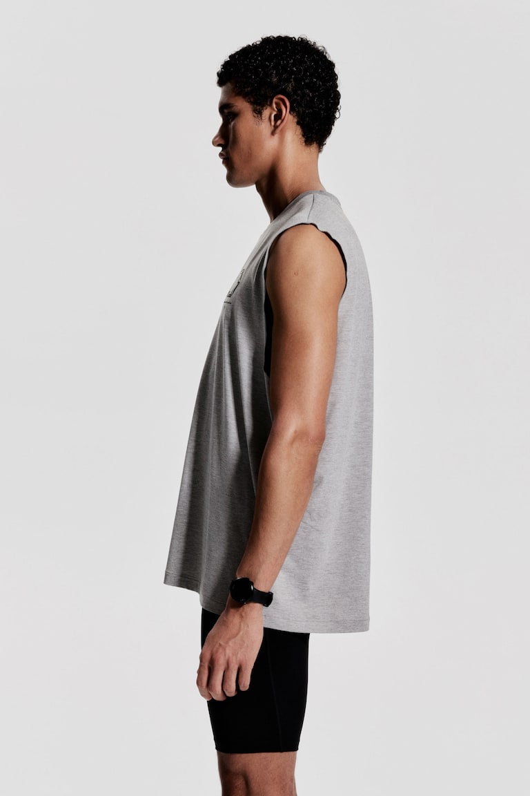H&M Camiseta De Deporte Con DryMove™ Loose Fit - Negro/Track Club - HOMBRE