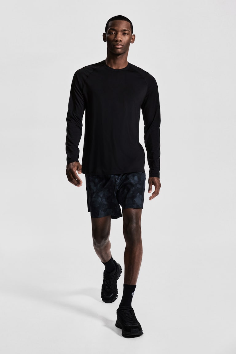 H&M Camiseta de deporte con DryMove™ Muscle Fit - Negro - HOMBRE