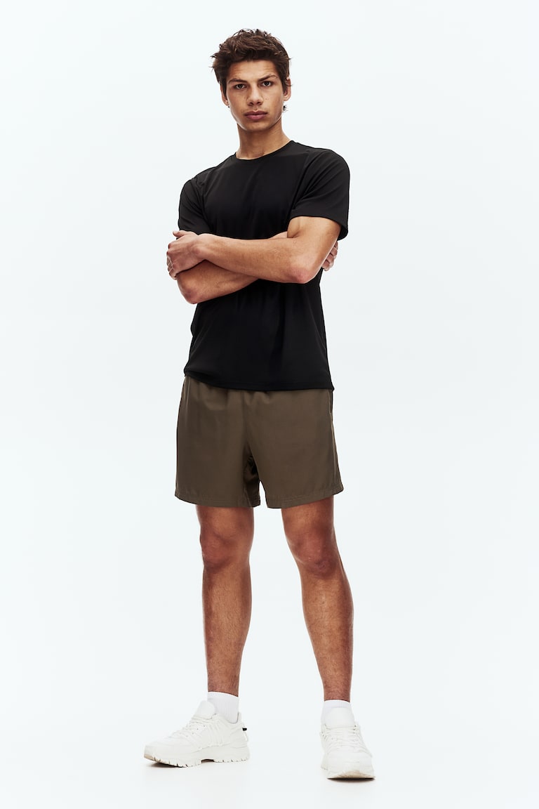 H&M Camiseta de deporte con DryMove™ Regular Fit - Azul marino - HOMBRE