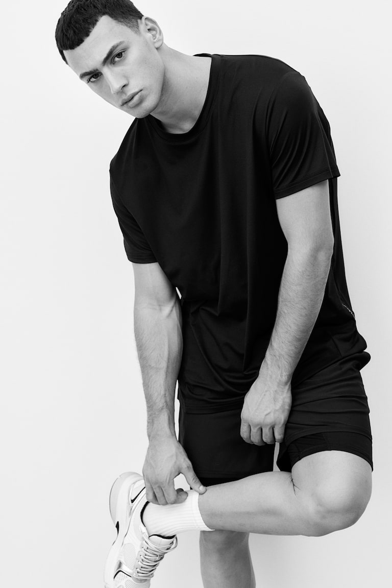 H&M Camiseta de deporte con DryMove™ Regular Fit - Azul oscuro - HOMBRE