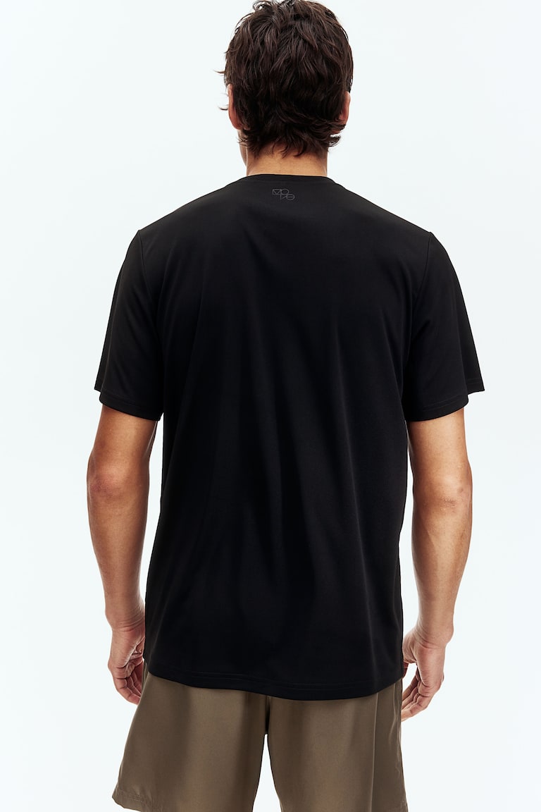 H&M Camiseta De Deporte Con DryMove™ Regular Fit - Negro - HOMBRE